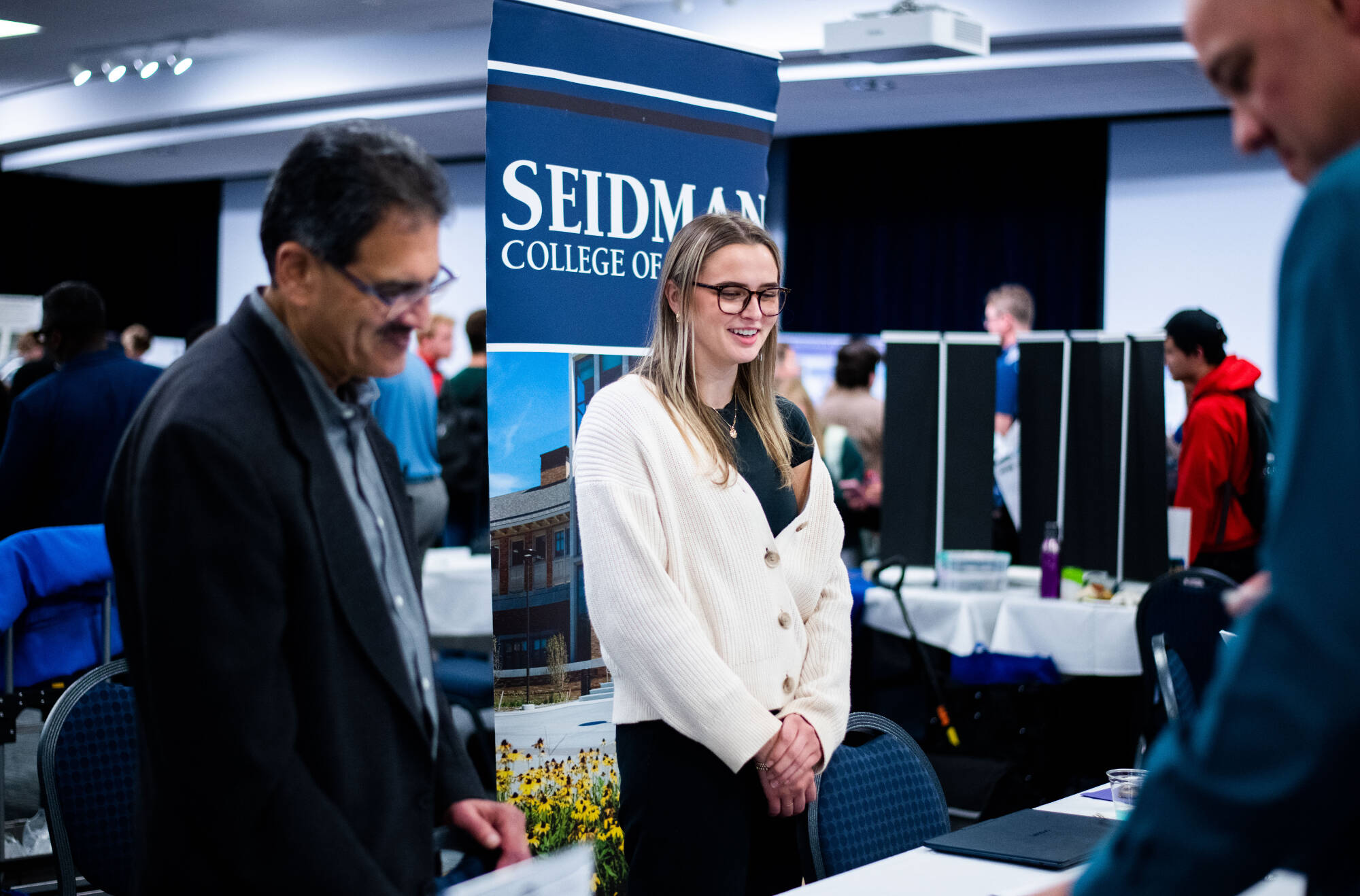 Student talking to professor